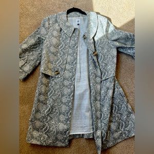 Size M Snake print coat. Great for casual dinner, church, or nice work events!